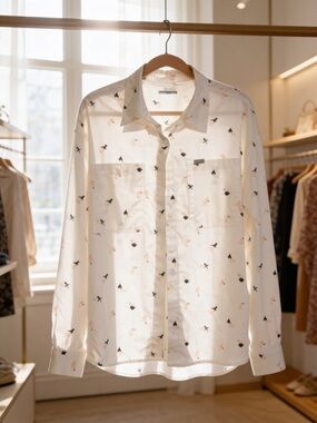 Columbia woman’s White Printed Button-Up Shirt - Subtle khaki and peach pattern.